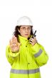 Talking with a walkie talkie and orders to stop