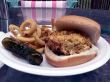 crabcake sandwich with fries and pickle 3