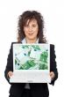Business woman showing a laptop