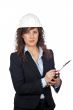 Female architect writing