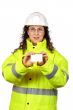 Female construction worker holding one blank card