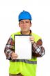Construction worker showing a blank notebook