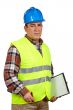 Construction worker with green safety vest