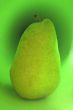 Green pear on a green background