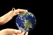 Holding the blue globe