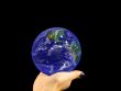 Blue globe on black