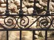Stone wall and metal lattice