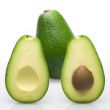 Avocado and its open flesh parts with stone