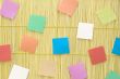 Colorful notes on mat background