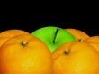 fruits apple and oranges closeup