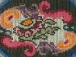 Embroidery on a fabric.