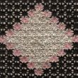 Embroidery on a fabric.