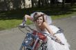 Bride and groom on a motorcycle