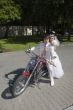 Bride and groom on a motorcycle
