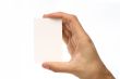 Man holding a business card