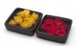 Fresh fruit salad on the two black bowls