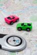 Compass and two cars, on the map