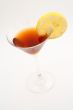 Red cocktail with lemon