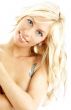 smiling topless blond