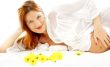 smiling pregnant beauty with flowers