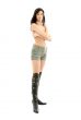 topless brunette in green shorts and boots