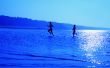 running girls over blue