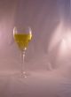 Crystal wine goblet with white wine