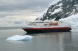Cruise ship at anchor with glaciers