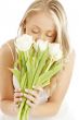 happy blond with white tulips