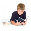 young boy studying