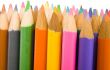 coloured pencils in a row