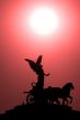 A statue in silhouette