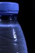 Water bottle against black