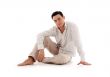 relaxed man sitting on the floor
