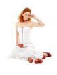 lovely redhead in red shoes with apples
