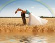 stretching woman with rainbow and water