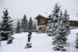 Snowshoe hikers approach the hut