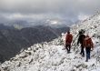 Hikers in new snow