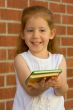 girl offers book