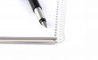 Business concepts - notebook and pen