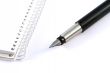 Business concepts - notebook and pen