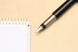Business concepts - notebook and pen