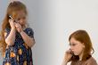 Two girls with cell phones