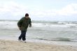 Man is running against the storm