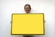 Smiling women with a sign board