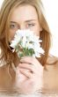 girl with white chrysanthemum in water