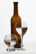 brown bottle and glasses