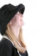 pretty young lady in hat taking sun