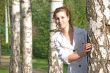 The girl behind a birch
