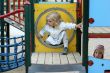 smal girl at the children`s playground